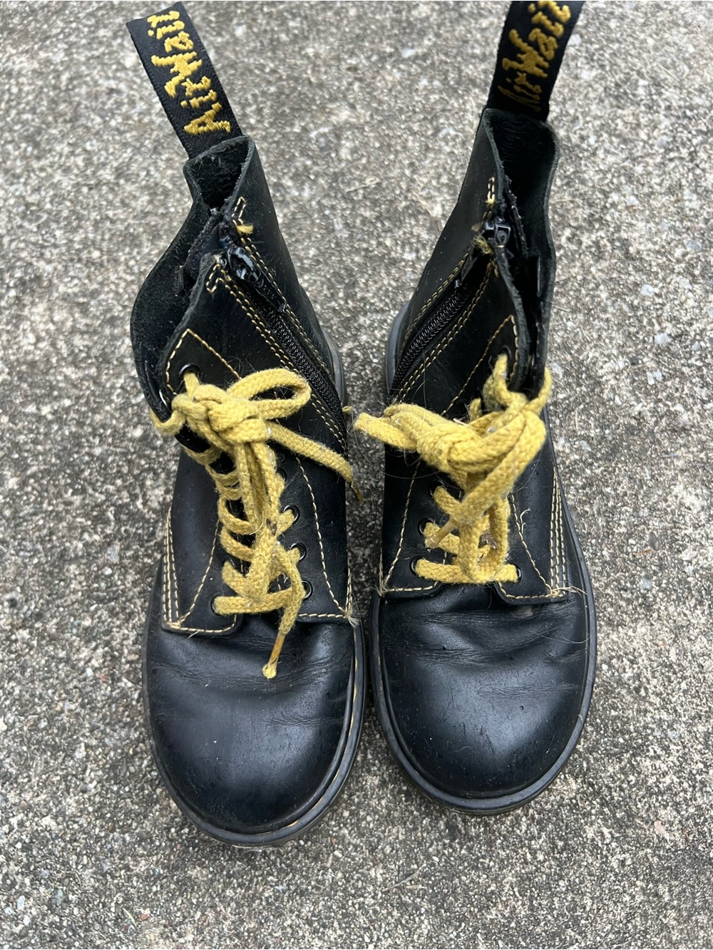 Dr. Martens Black Leather Lace-Up Boots with Yellow Accents